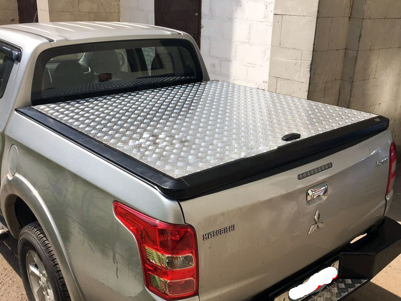 Mitsubishi L200 / Крышки / Крышка кузова ALUMINIUM TONNEAU COVER "EGR" (Австралия) на пикап  Mitsubishi L200 new от 2015 года.