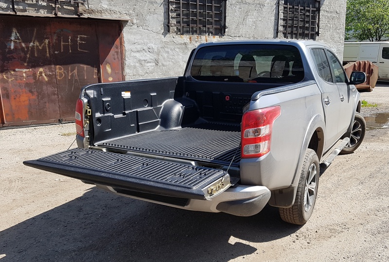 Mitsubishi L200 / Вкладыши и ящики в кузов / Вкладыш в кузов с заходами на борт Riggetliner