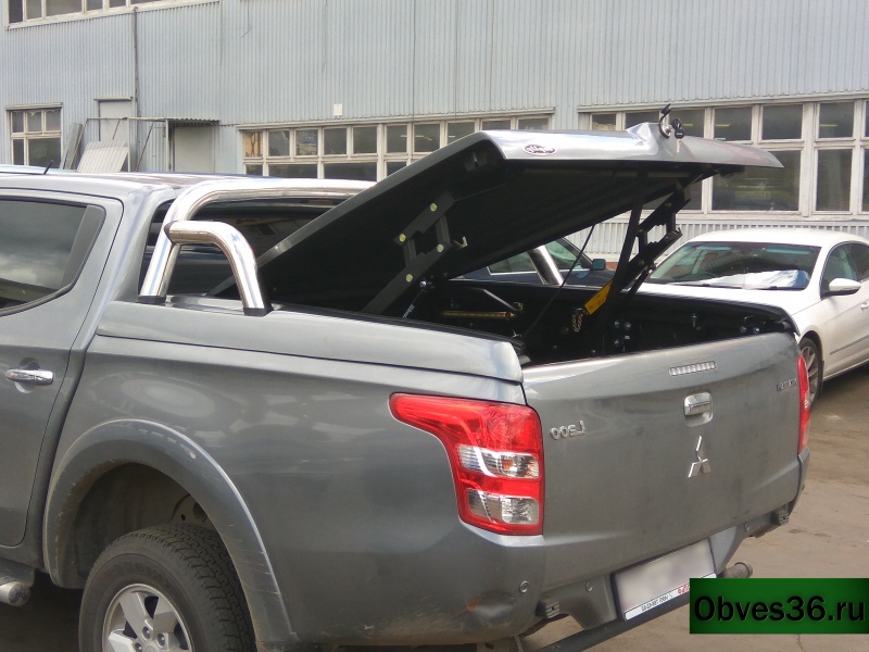Mitsubishi L200 / Крышки / Крышка TopUP с защитной дугой (2015-) Mitsubishi L200 / Крышки / Крышка TopUP с защитной дугой (2015-)