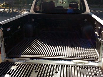 Mitsubishi L200 / Вкладыши и ящики в кузов / Вкладыш в кузов под борта "RuggedLiner"